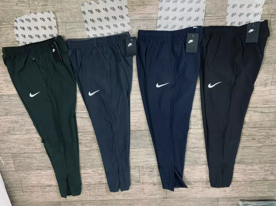 Nike 
Premium Dri-fit Trackpants
Nylon NS Lycra
4 Shades  uploaded by Gentlemen's Wholesaler and trader on 8/10/2022