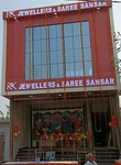 Business logo of Rk jwellers and saree sansar