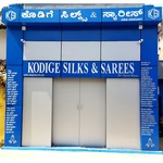Business logo of Kodige Silks and Sarees