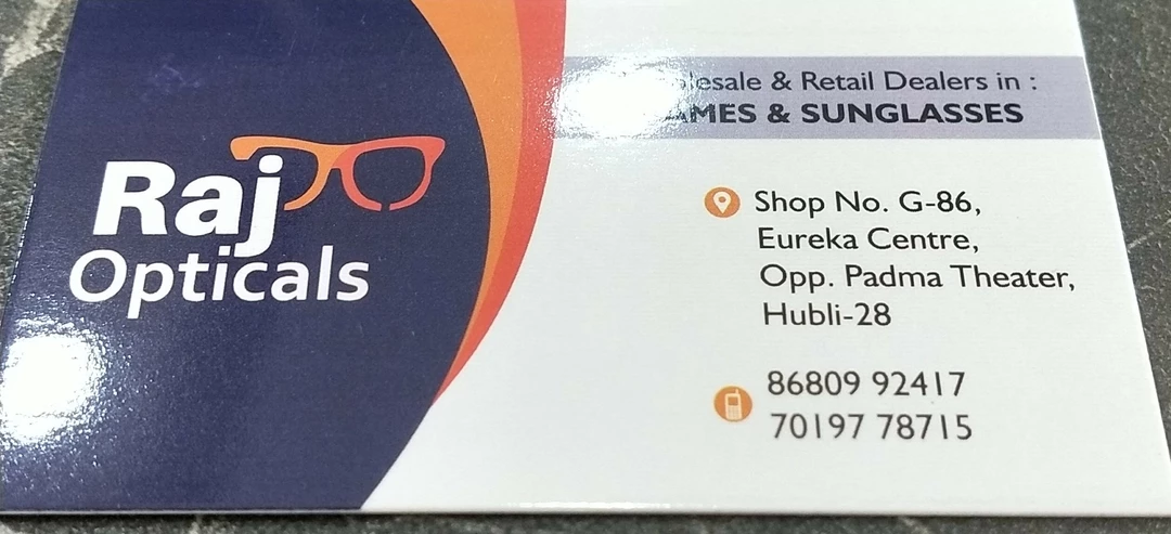 Visiting card store images of Raj opticals 