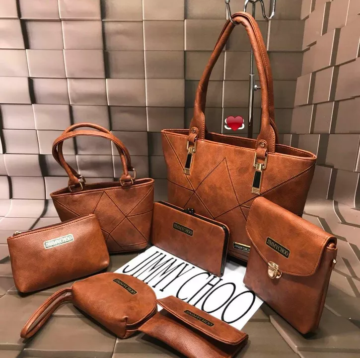 Post image *RESTOCK*. *Back again *
Jimmy choo 7pcs Combo back again 😊
Famous model Double zip handbag Sling🤘Wallet💰Mobile sling🤳Coin pouch💸Card holder 💳
All your needs would be answered here 😎*Same quality &amp; size.material* With *good quality  
₹@850+/only