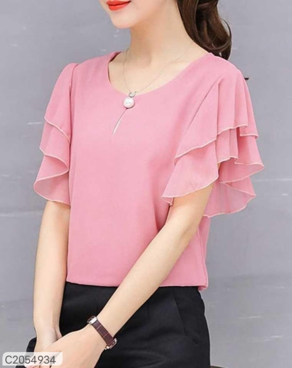Post image *Catalog Name:* Women's Georgette Solid Ruffle Sleeve Neck Button Top
*Details:*Product Name: Women's Georgette Solid Ruffle Sleeve Neck Button TopPackage Contains: It has 1 Piece of Top
Sizes in Inches: 36
Color: Pink
Fabric: Georgette
Pattern: Solid
Style: Ruffle
Occasion: Casual
Combo/Set of: Pack of 1
Sleeve Length: Flared Sleeve
Wash: Machine
Neck Type: Keyhole NeckWeight: 100
Designs(डिज़ाइन): 6
💥 *FREE Shipping* (फ्री शिपिंग)💥 *FREE COD* (फ्री केश ऑन डिलीवरी)💥 *FREE Return &amp; 100% Refund* (फ्री रिटर्न और 100% रिफंड)🚚 *Delivery*: Within 7 days (डिलीवरी 7 दिनों में)