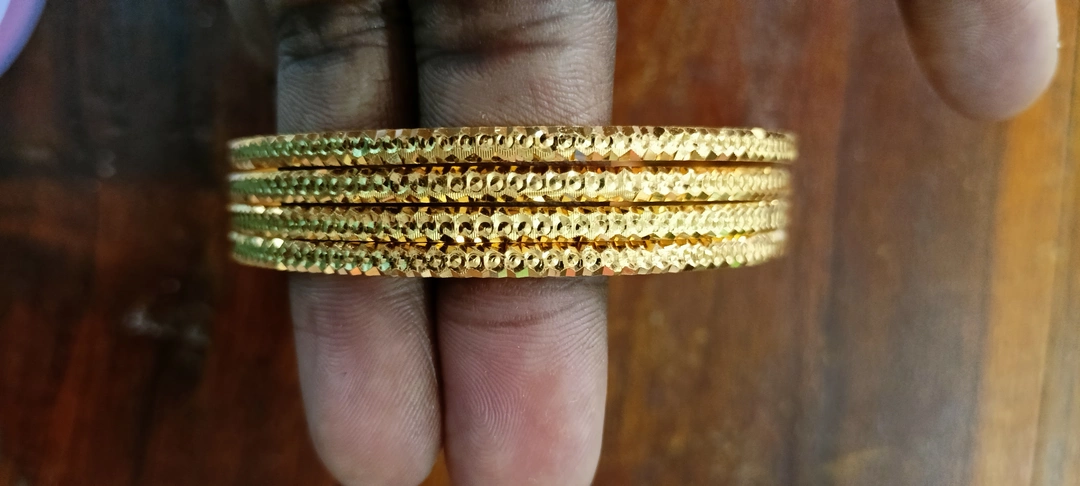 Post image I want 50 pieces of Bangles at a total order value of 5000. I am looking for 22-24-26-28-2-10. Please send me price if you have this available.