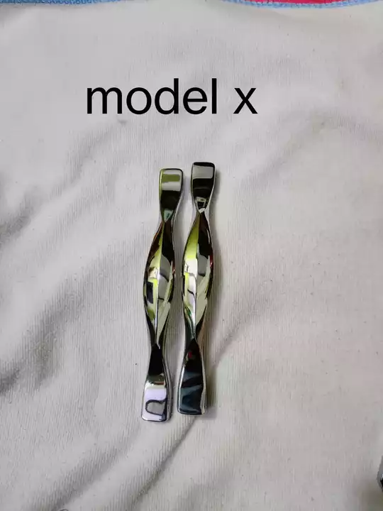 White metal model X handle uploaded by business on 9/4/2022