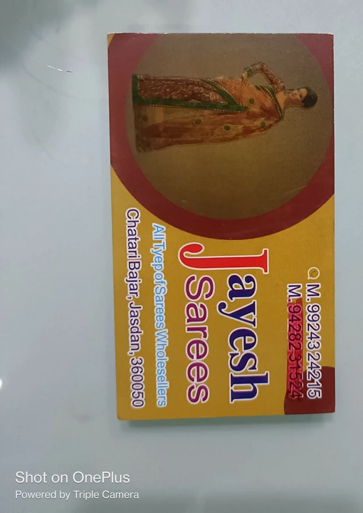 Visiting card store images of Jayesh saree center
