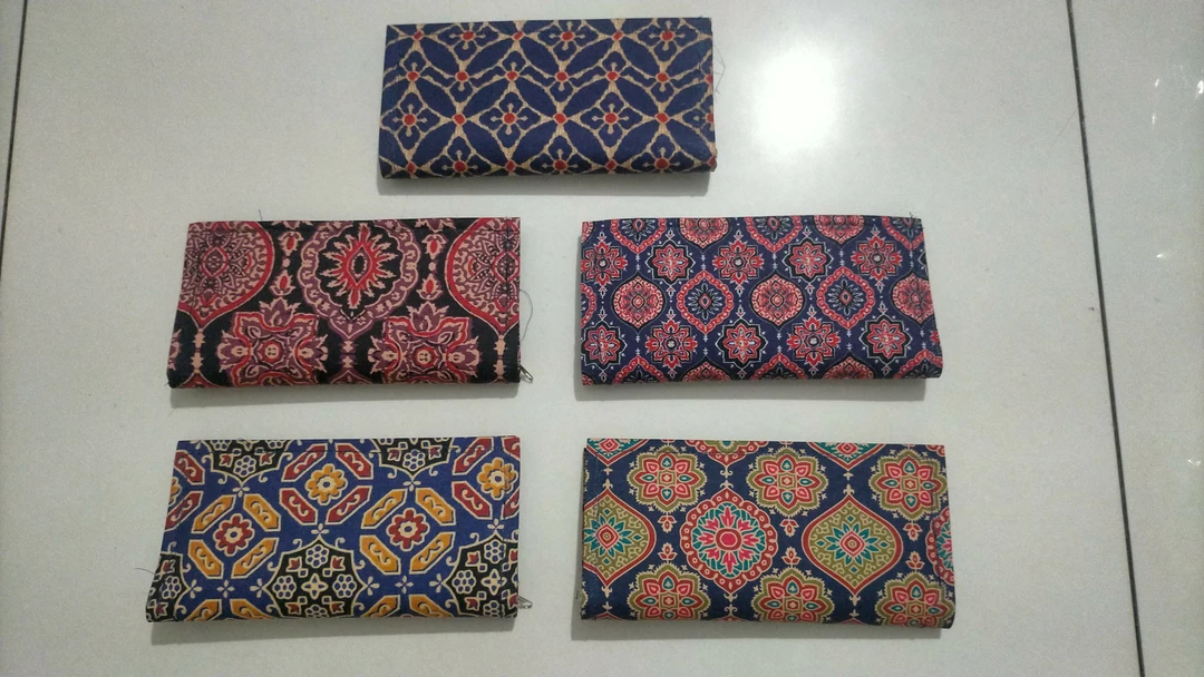 Printed hand clutches  uploaded by business on 9/5/2022