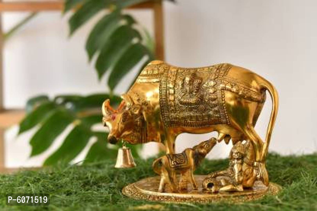 Metal kamdhenu cow and calf with laddu Gopal ji statue , size 6.5 inch approx, weight 400 gram uploaded by business on 9/11/2022