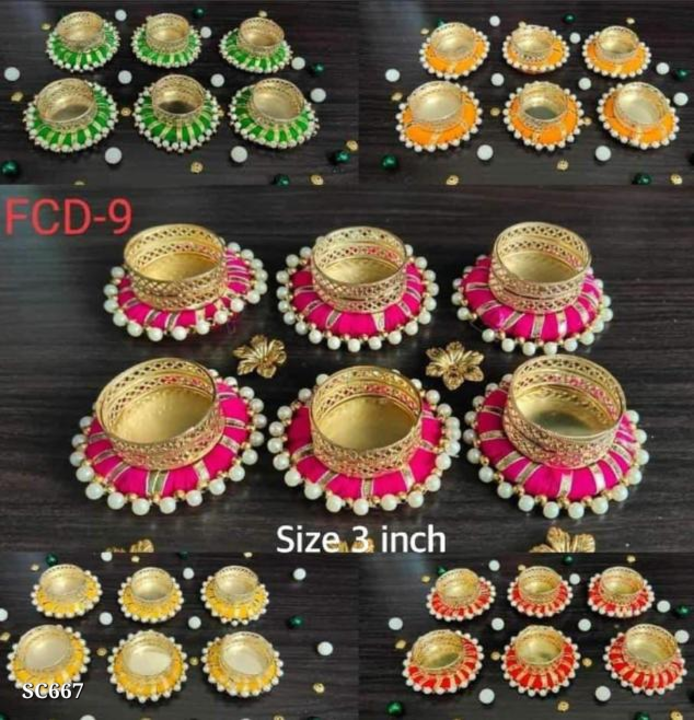 Post image Catalog Name: *Decorated Diya 🪔 set of 5*
Decorated Diya 🪔 set🤩 For Navratri &amp; Diwali festival 🎉  Set of 6 with wax candle 🕯 
*Price: ₹345 _*Free COD! Free Shipping!