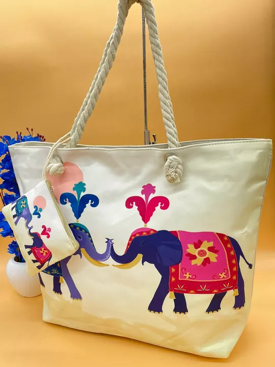 Post image *Here is another surprise for you...* 

PREMIUM COLLECTION        
  
Make your life unique and Beautiful with this tote bag👝
 
The most Iconic *ELEPHANT TOTE BAG💯♥️*

One main compartment
And one inside pocket to hold mobile phones🥰

Pouch available for holding some cash and coins💲🪙 

Size—
Bag- 20.5 × 14.5
Pouch- 6 × 5😍

Long handle helps you to easily carry the bag on your shoulders😘

Contains large space capacity to hold laptops / macbook /  tablets and other essentials 💯

5 -prints available and can be matched with your several outfits 🌈

Specially designed for small trips and travelling 🤝

 So be the first to book this amazing product limited stock available 
Give Your orderss Noww

*BEST PRICE*