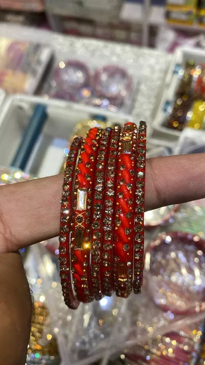 Post image I want 50 Box of Glass bangles set at a total order value of 10000. I am looking for Need for wholesale price . Please send me price if you have this available.