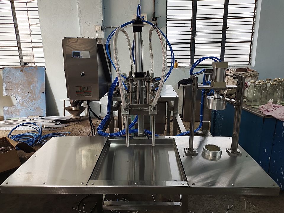 Post image Organic milk filling and lug capping machines