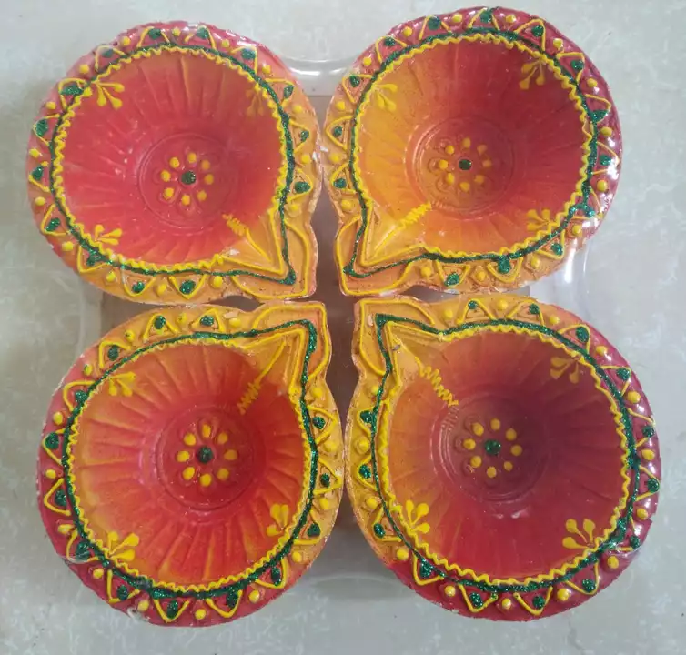 Post image Decorative clay diya having unique and colourful designs. Best for corporate gifting a also.