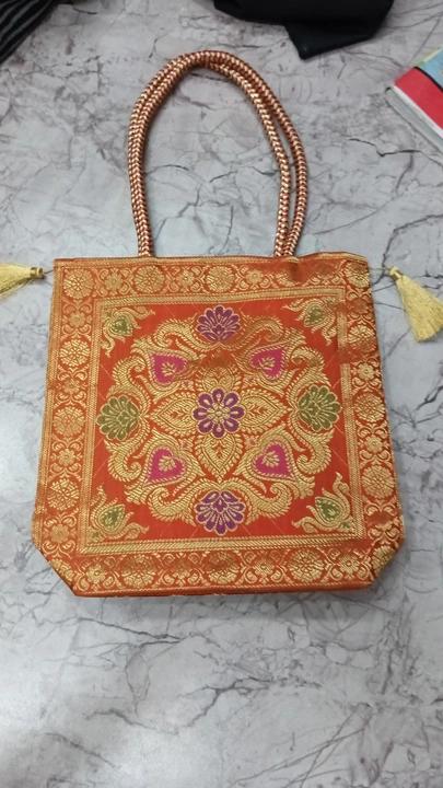 Banarsi rich zari bag size 10*10 uploaded by Saree suit ladies purse bag bed cover etc. on 10/16/2022