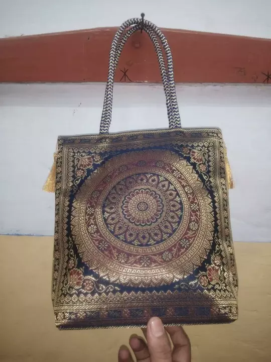 Banarsi rich zari bag size 10*10 uploaded by Saree suit ladies purse bag bed cover etc. on 10/16/2022