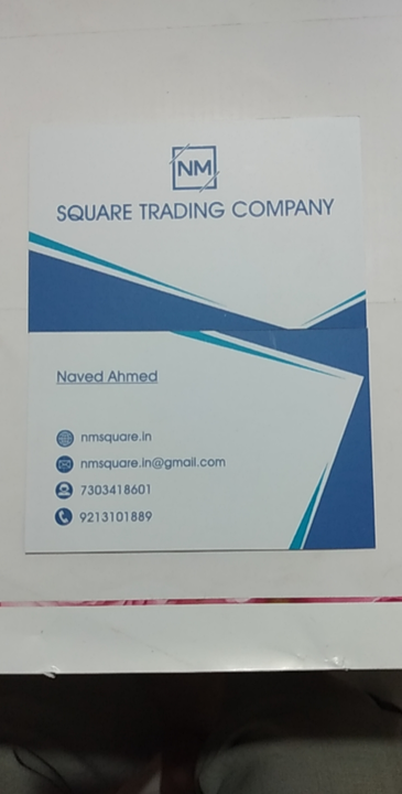 Visiting card store images of NM SQUARE TRADING COMPANY