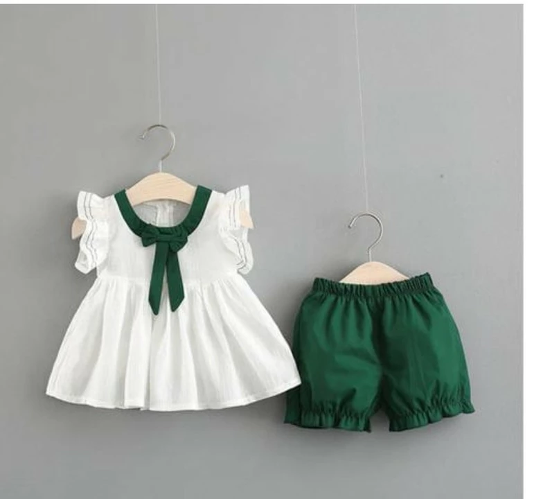Little Girls were frock white & shorts bottle green colour rayon 01 uploaded by Prem Ratan textile on 10/26/2022