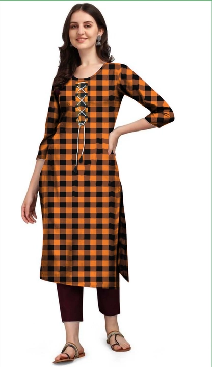 Post image Woven checked kurti for women. It has a round neck faggoting technique three quarters sleeves fit and flare comfortable dress