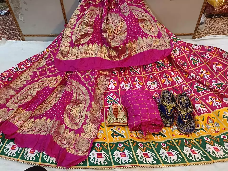 Post image 😍😍new launched Nice bful patola silk lehnga semistitched lhnga with lining full touch astar with bija border Waist 42 Length 40,42With checks silk 80 cm blousw 👉🏼Dupatta heavy banrasi silk bnadhej 2.3 mBokk fast All are ready to ship😍price only 1350+sRajasthani slipper comes free free free as shown in picNote : dont accept without slippersContact 9772325609whatapp n call