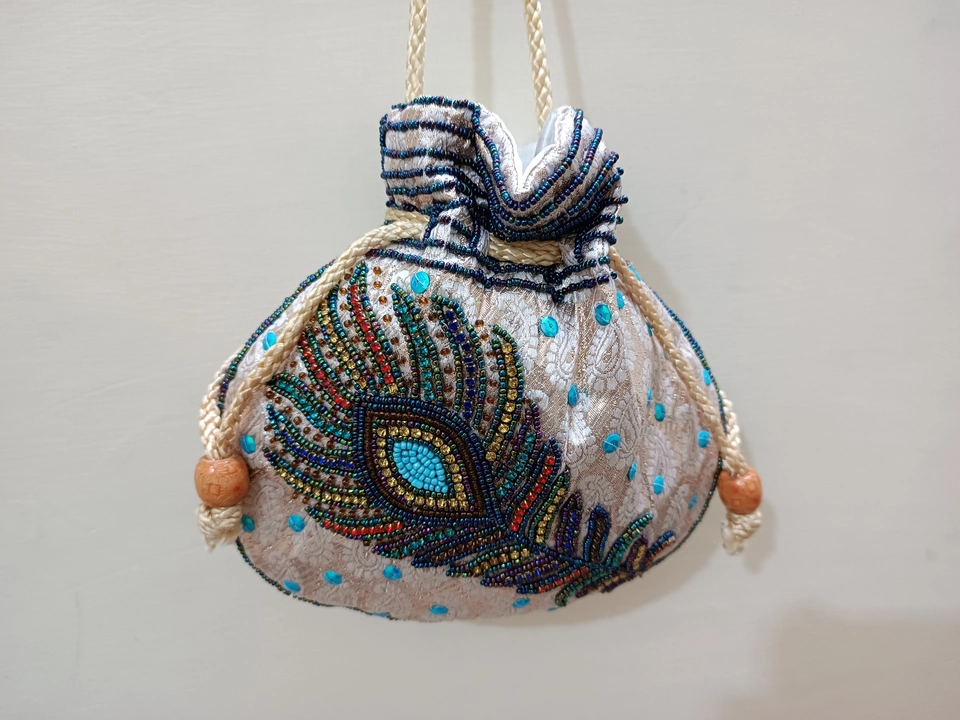Beaded women potli bag uploaded by business on 11/14/2022