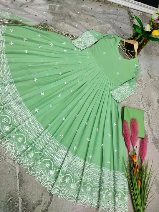 Post image 👗*Launching New Party Wear Look Gown &amp; Dupatta Set *👗🧚‍♀️⭐️
🧵*FABRIC DETAILS*🧵👇
*👉🧚‍♀️Gown Fabric* :Heavy Faux Georgette With Embroidery 5 mm Sequence Work &amp; Cutwork With Sleeve  *👉🧚‍♀️Gown Inner* : Micro Cotton*👉🧚‍♀️Gown Size* : Up To 42 Xl Free Size &amp; XXl 44 Margin *(Fully Stiched )**👉🧚‍♀️Gown Length* :55-56 Inches*👉🧚‍♀️Gown Flair *   : 3 Meter 
*👉🧚‍♀️Bottom Fabric* :Heavy Micro cotton *(UnStitched)*
*👉🧚‍♀️Dupatta Fabric * :Heavy Butterfly Net With Embroidery 5 mm Sequence Work With Latkan*👉🧚‍♀️Dupatta Length *:2.20 Meter
⚖️ *Weight* :900 gm
👉*Rate :-1299+$/- *👈
📌🧚‍♀️ *FULL STOCK READY TO SHIP* 🛳🚚🛍
*Unique Design For Your Unique Style……!!!!*👌⭐️ *Good Quality * ⭐️💗💫