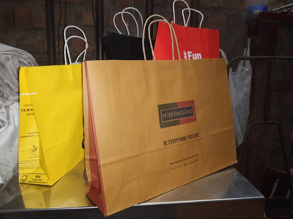Paper bags for clothes and other products all sizes available  uploaded by business on 11/24/2022