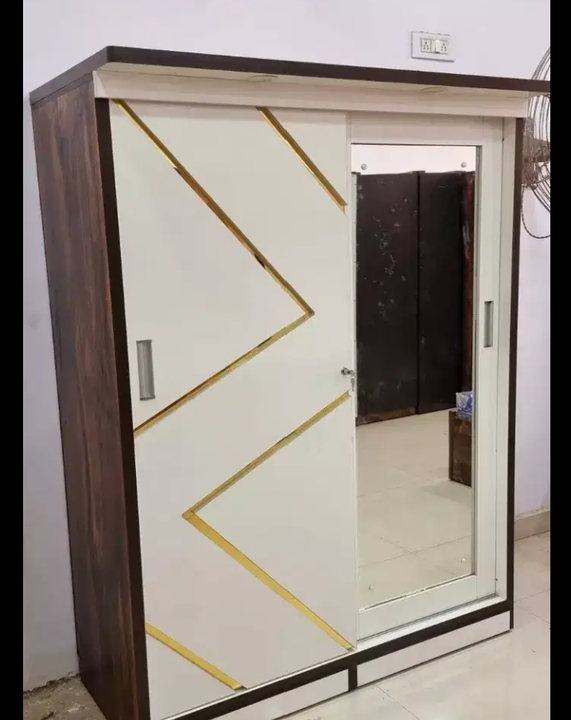Engineering wood sliding door cabinet uploaded by Vinod Steel and wooden furniture  on 11/25/2022