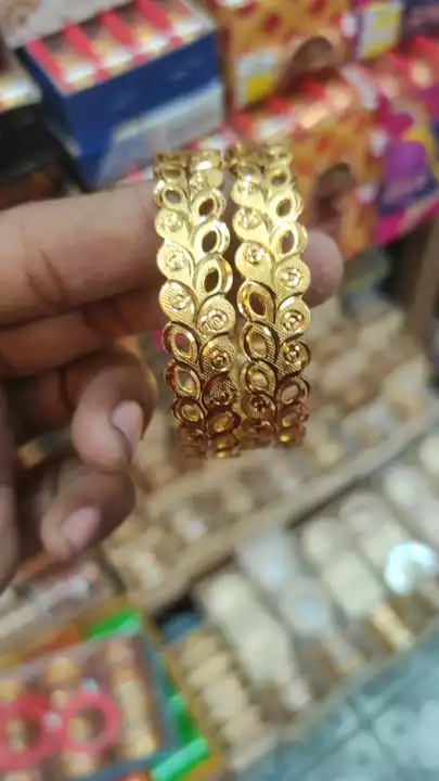 Post image Wholesale gold printed bangles

Join and flowing Facebook page wholesale jewellery
https://www.facebook.com/profile.php?id=100078357526424&amp;mibextid=ZbWKwL.  Like and follow Facebook page wholesale jewellery