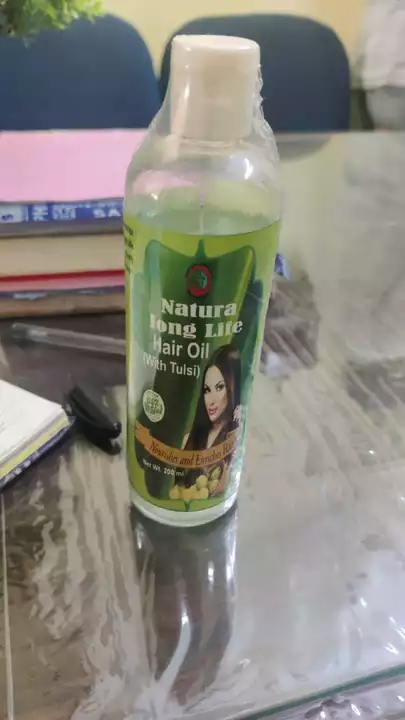 Long life hair oil with Tulsi  uploaded by business on 12/6/2022