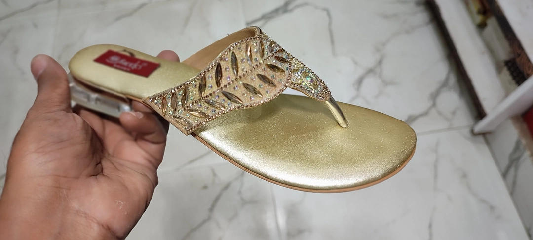 Golden flat glass heel uploaded by business on 12/15/2022