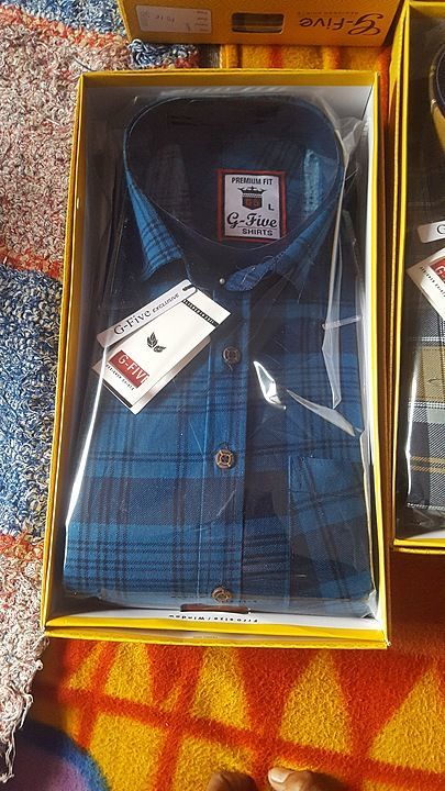 check shirt uploaded by business on 2/3/2021