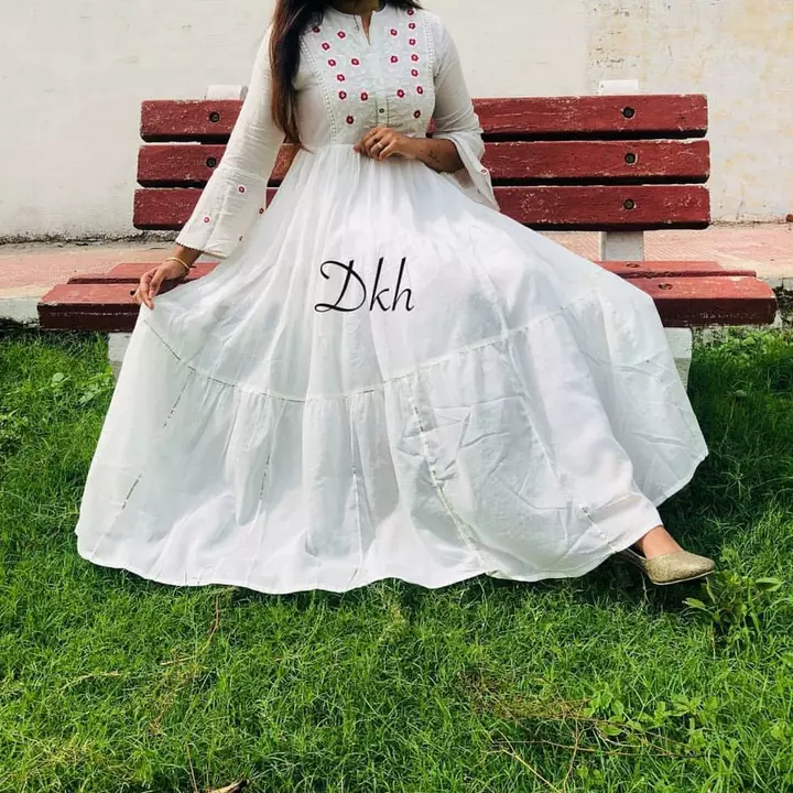 *White Full flair Bell salves Gown in soft Reyon in Tier pattern with mulmul lining*

*With gotta la uploaded by JAIPURI FASHION HUB on 12/19/2022