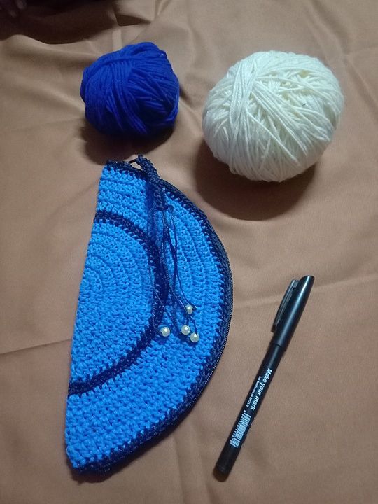 Half moon crochet clutch uploaded by business on 2/4/2021