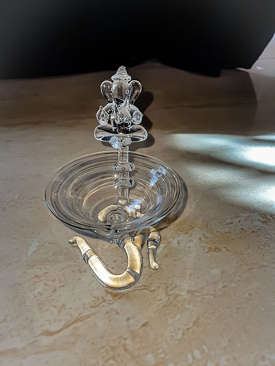 crystal diya with ganesh and OM  uploaded by business on 7/4/2020
