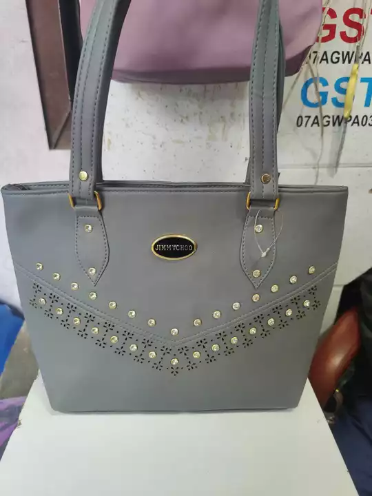 Ladies purse available only Bulk quantity limited time  uploaded by Aman Enterprises WhatsApp or call +919711706212 on 12/30/2022