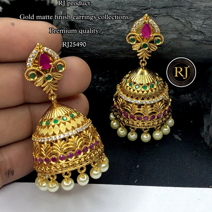 Gold matt finish jumki earrings  uploaded by Radhe jewellery  on 5/28/2024