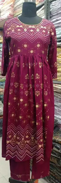 14 kg Rayon nyraa cut with pant
Gold print and side tussle Dori
Sequence work 
 uploaded by KW kurti on 1/3/2023