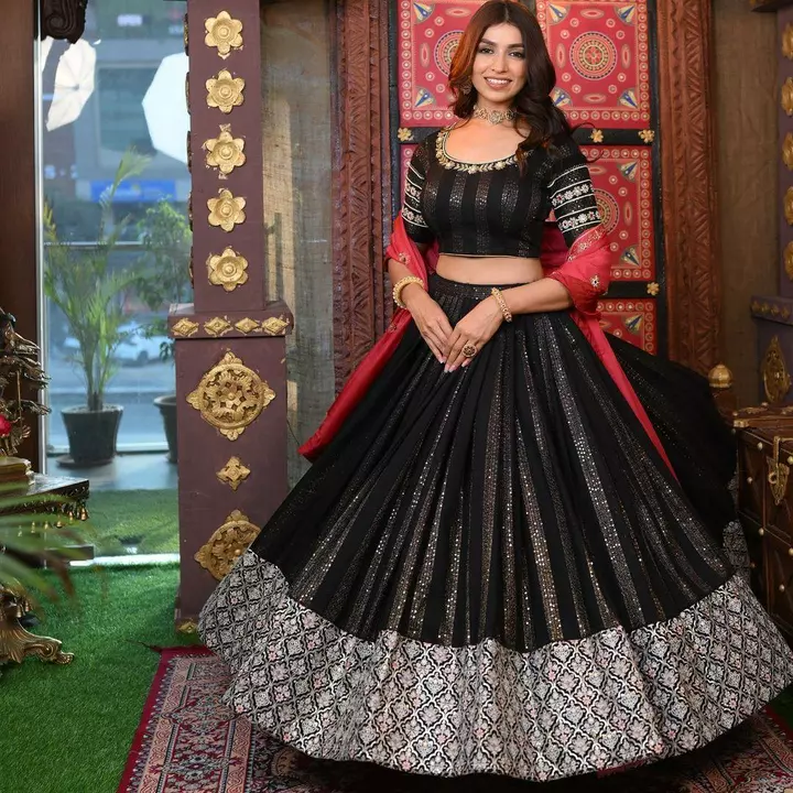 Post image FOR PLACED ORDER WHATSAPP : 9036827715 ( KBC )
(DC-2042) 093💃Lehenga choli💃
Black Colour Embroidered Attractive Party Wear Georgette Lehenga choli has a Regular-fit and is Made From High-Grade Fabrics And Yarn.
💃 Lehenga Fabric :- Georgette 5mm Sequence Work. 
 💃 Lehenga Inner :- Micro Silk
 💃 Lehenga Work :- Multi Needle Work, 5mm Sequence Work, Embroidery Work, Zari Work. 
 💃 Lehenga Type :- Semi Stitched
🧣 Dupatta Fabric :- Heavy Georgette Sequence 5mm With Fancy Border Latkan Work (dupatta size 2.40 meter)
👚 Blouse Fabric :- Georgette, 5mm Sequence Work
 👚 Blouse Work :- 5mm Sequence Work, Embroidery Work, Zari Work. 
 👚Blouse Type :- Unstitched 
💭 OCCASIONS :- Festival, Party, Traditional, Wedding, Dulhan Lehenga , Bridal Lehenga, Marriage Special, Party Wear, Lehenga
 🧿Size :- Free Size, Lehenga: Length-42" Inches Width-up To 42 to 44". Flair bottom-up to 3.20 Mtr.
 🧭 Weight :-     KG
💵 RATE :- 1569+SHIP/-💸
👑 KING OF QUALITY 👑