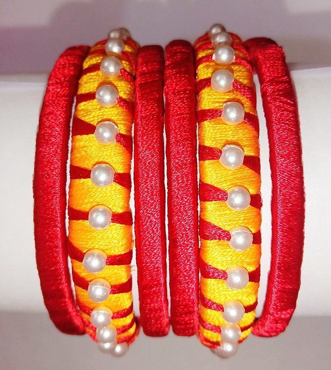 Post image Silk thread bangle with moti work...
Size and colour cam be customized.....
For customization contact us....