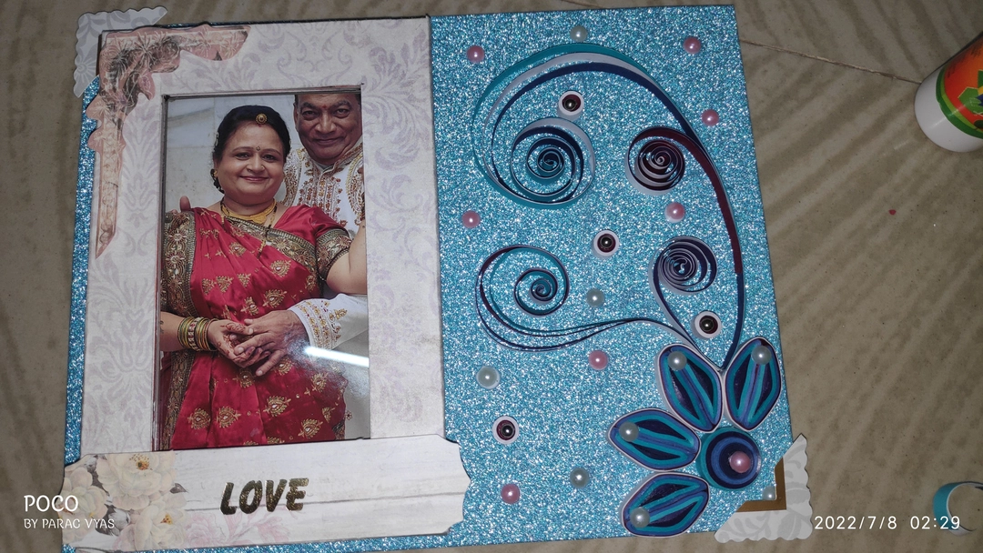 Customized quilled photo frame uploaded by business on 1/4/2023