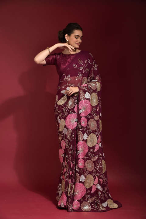 Post image In an easy drape, this sequins piece of designer wear is a perfect outfit for social gatherings. Shaded in multiple color threads and composed with sequins embroidery all over, this saree holds magnificent grace in its drape.*