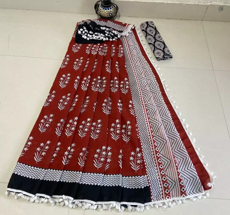 Hand block printed cotton mul mul sarees with pom pom lace. uploaded by The print house  on 1/7/2023