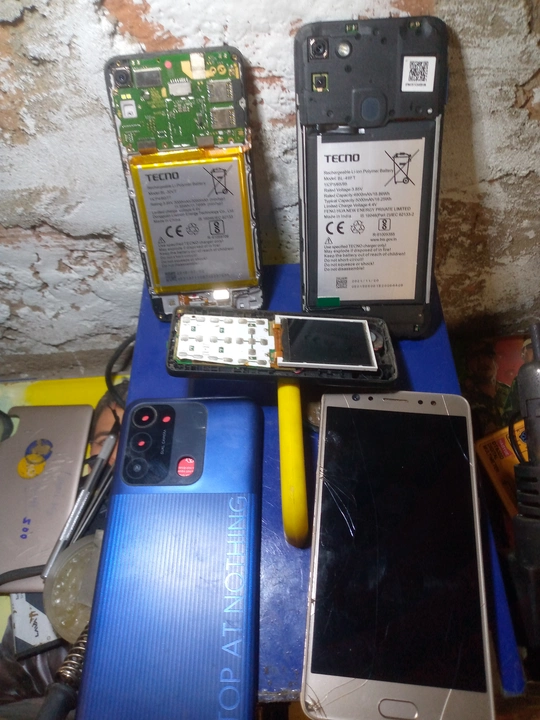 Visiting card store images of Manoj mobile repairing