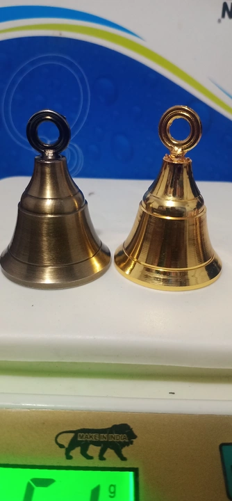 White metal bell uploaded by business on 1/9/2023