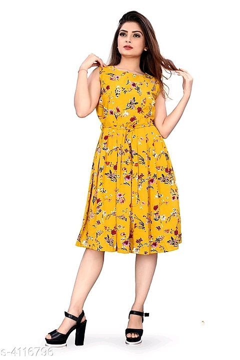 Women printed yellow dresses uploaded by business on 2/11/2021