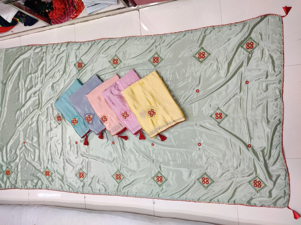 Post image catalog name. Kalawati 

Fabric- Chinnon  

Work- Multi Work With Latkan And Diamond 

Length- 6.10 Meters With Banglori Blouse

Packing- Chain Beg

piece- 6 

Brand-Umapati®