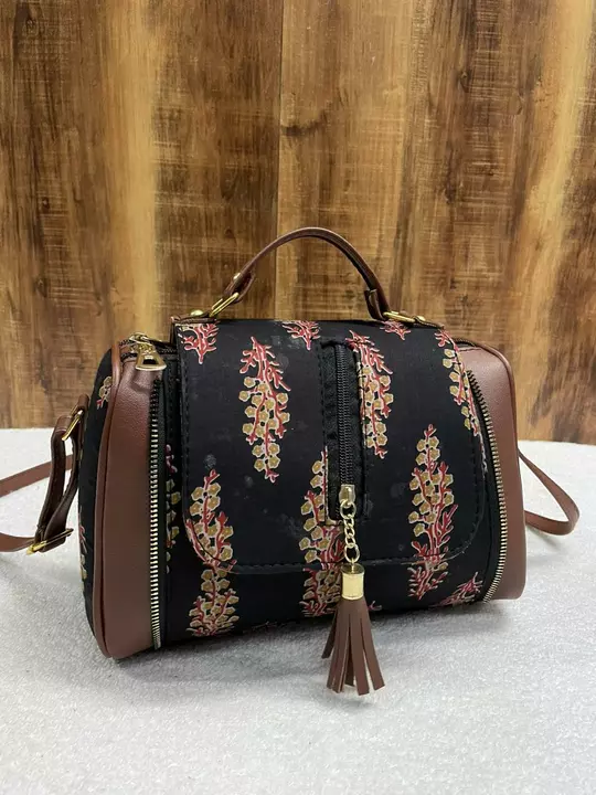 Cotton printed Katha stich double partition sling bag with one back side chain pocket. 
Size-9"9
Pri uploaded by Julu creation on 1/12/2023