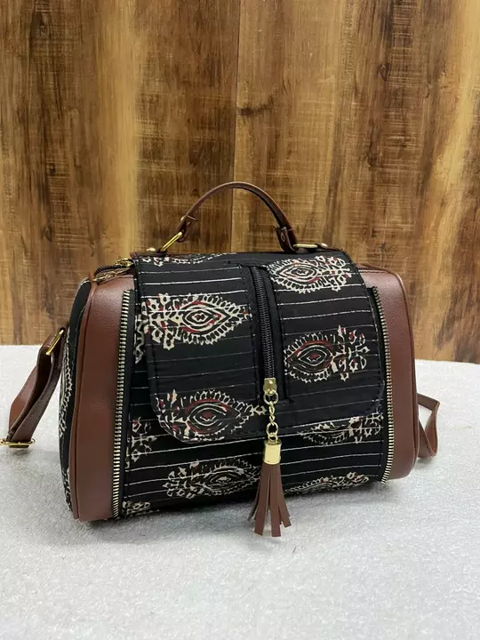 Cotton printed Katha stich double partition sling bag with one back side chain pocket. 
Size-9"9
Pri uploaded by Julu creation on 1/12/2023
