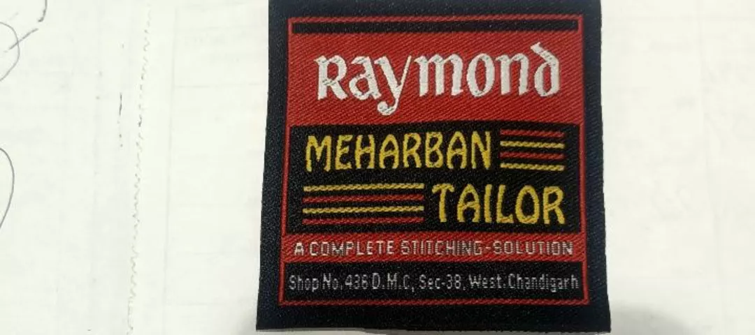Visiting card store images of Raymond meharban tailor