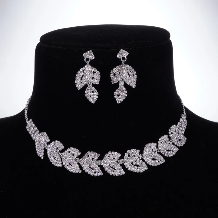 Stunning Silver AD-Diamond Choker Necklace Set with Elegant Pair of Earrings at affordable price. uploaded by business on 1/17/2023