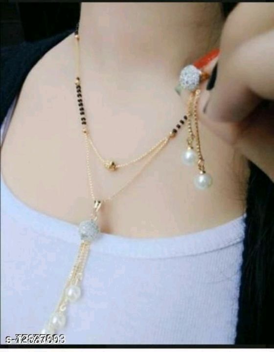 Catalog Name:*Feminine Fusion Mangalsutras*
Base Metal: Alloy
Plating: Gold Plated
Stone Type: Cubic uploaded by business on 2/13/2021